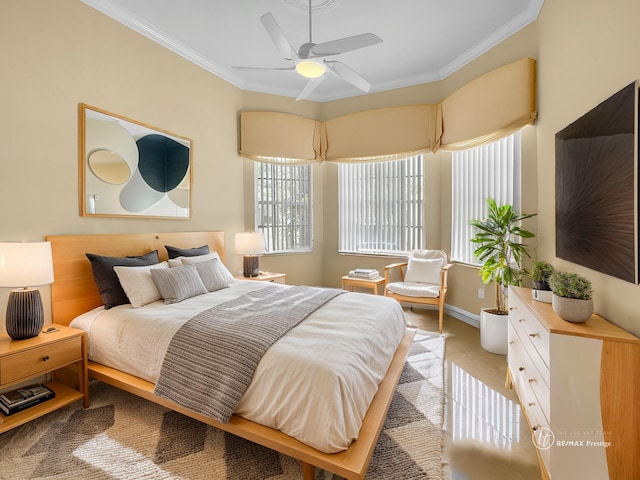 bedroom featuring ceiling fan, baseboards, and ornamental molding