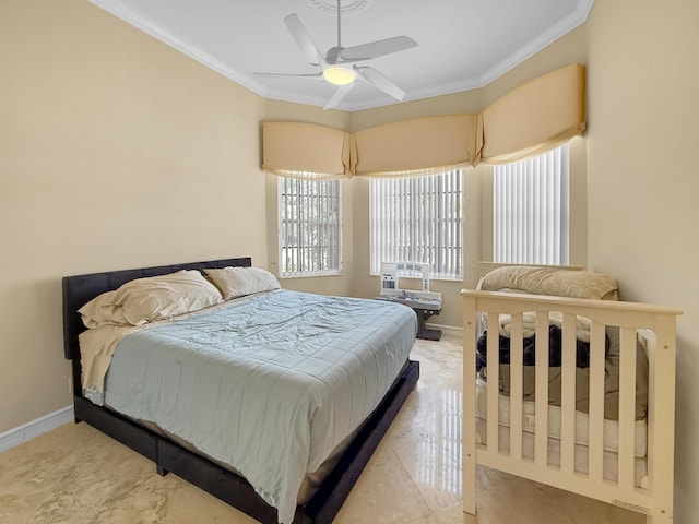 bedroom with ceiling fan, crown molding, and baseboards