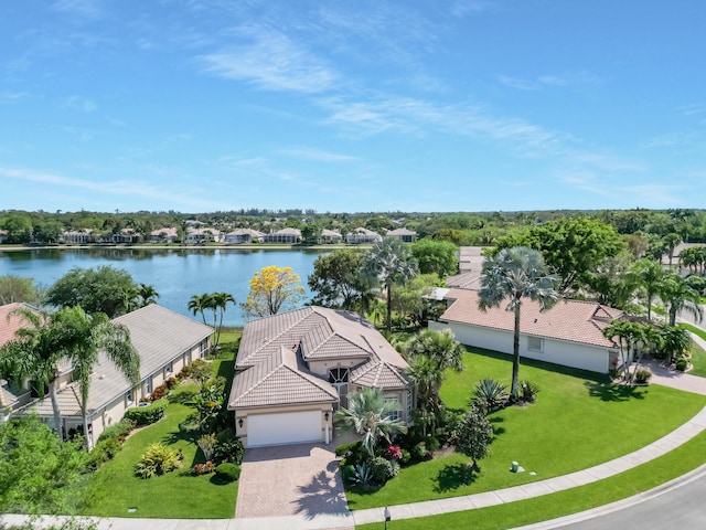 birds eye view of property featuring a water view