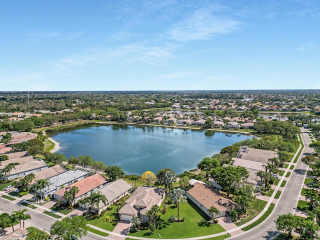 aerial view with a residential view and a water view