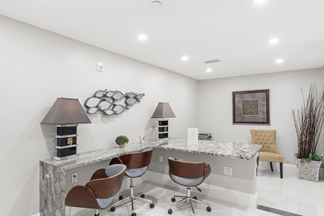 office featuring recessed lighting, visible vents, and baseboards