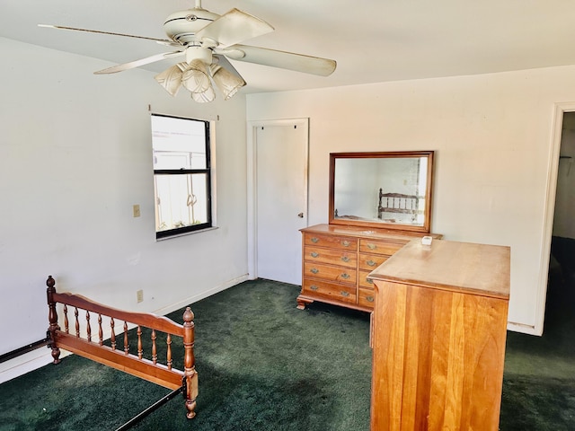 bedroom with baseboards, a ceiling fan, and dark colored carpet