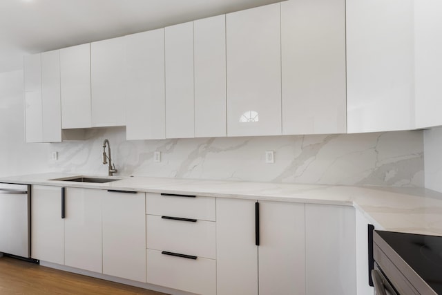 4524 Concordia Ln, Boynton Beach, FL 33436 - kitchen featuring dishwasher, white cabinets, modern cabinets, and light stone countertops