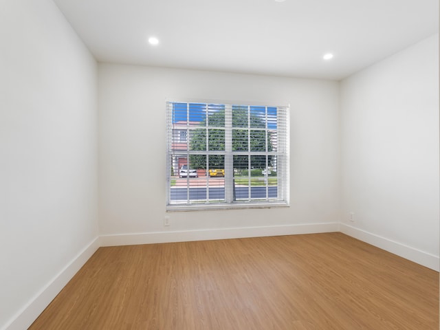 4524 Concordia Ln, Boynton Beach, FL 33436 - empty room featuring light wood-style flooring and recessed lighting