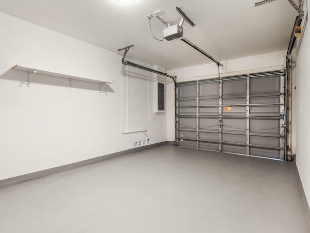4524 Concordia Ln, Boynton Beach, FL 33436 - garage featuring a garage door opener and electric panel