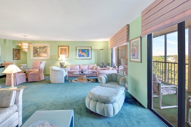 living room with baseboards, carpet, and a chandelier