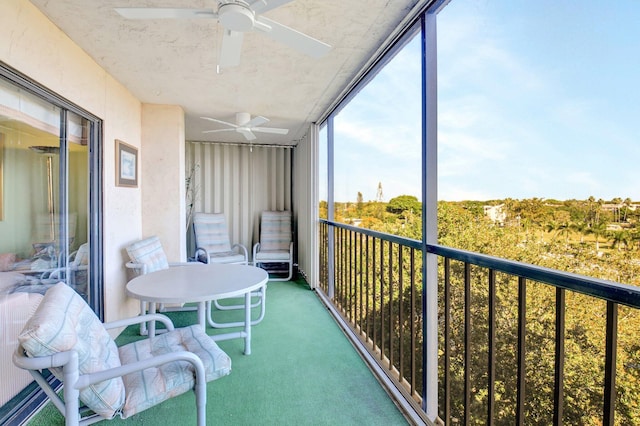 balcony with a ceiling fan