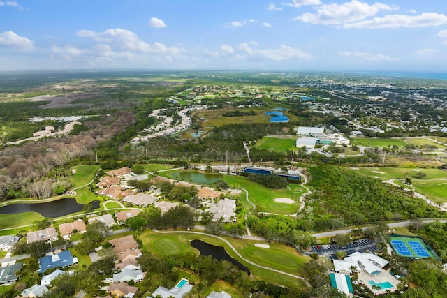 aerial view with a water view and golf course view