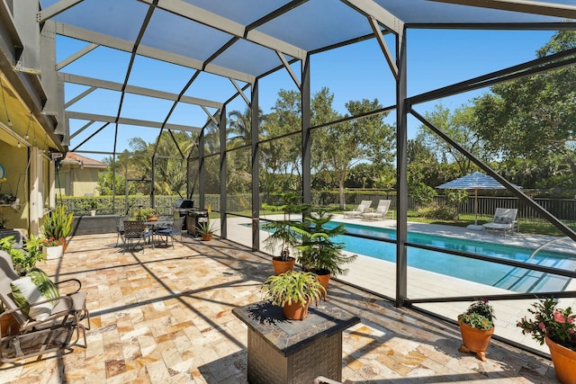 exterior space featuring an outdoor pool, glass enclosure, outdoor dining area, and fence