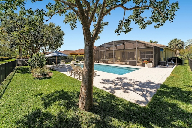 view of swimming pool featuring a patio area, a yard, a fenced backyard, and a fenced in pool