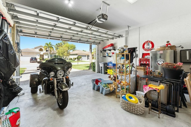 garage featuring a garage door opener