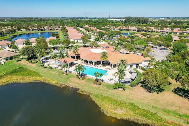 birds eye view of property featuring a residential view and a water view