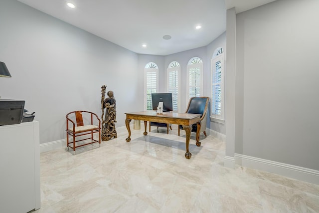 office area with recessed lighting, baseboards, and marble finish floor