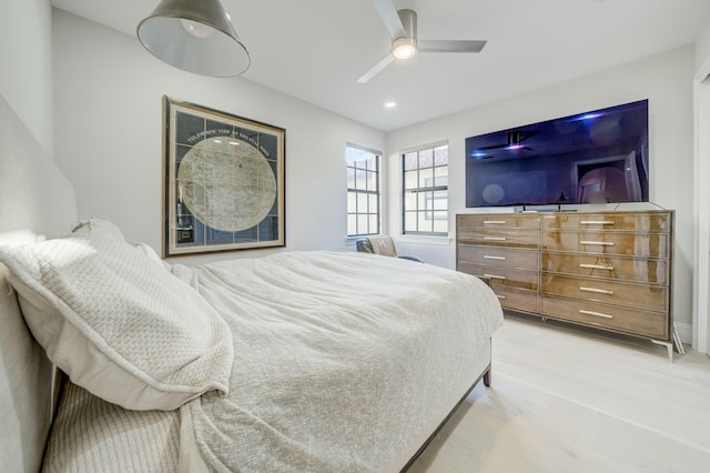 bedroom featuring recessed lighting, wood finished floors, and a ceiling fan