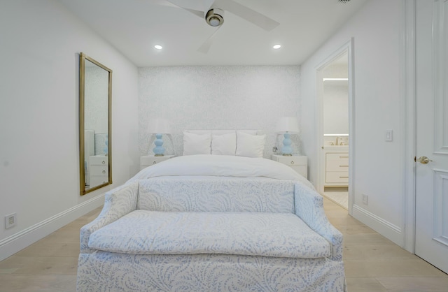 bedroom with light wood finished floors, recessed lighting, and baseboards