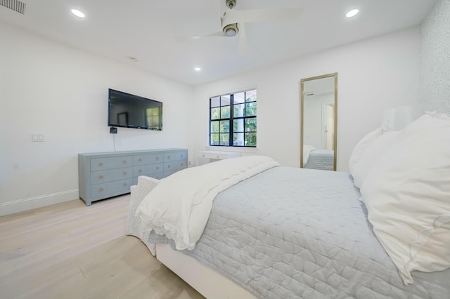 bedroom featuring recessed lighting, visible vents, light wood-style flooring, and a ceiling fan