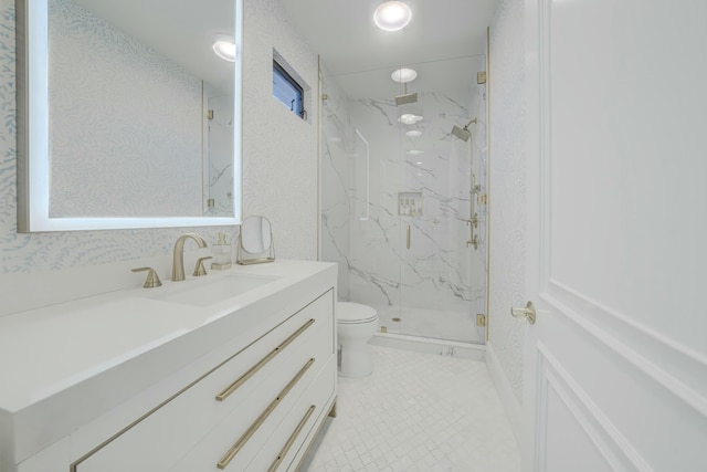 bathroom with a marble finish shower, toilet, recessed lighting, tile patterned floors, and vanity