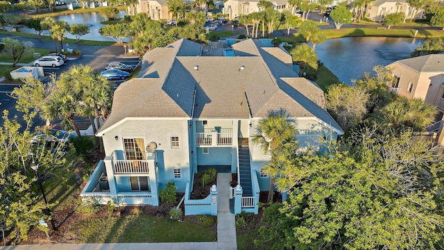 aerial view with a residential view and a water view