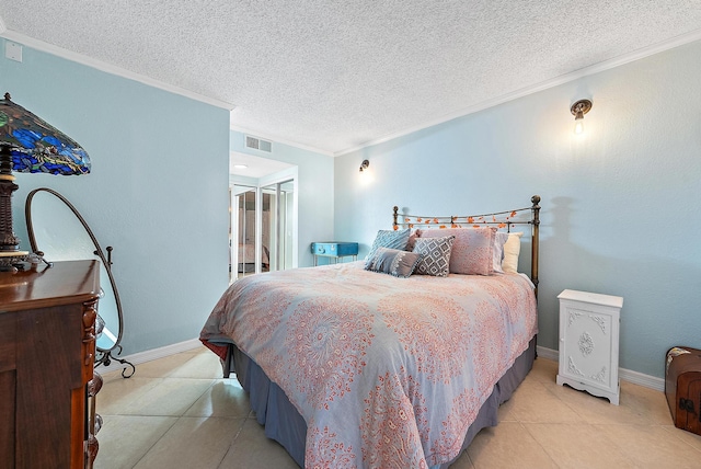 bedroom featuring visible vents, a textured ceiling, baseboards, and ornamental molding