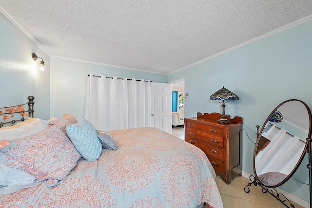 bedroom featuring light tile patterned flooring, a textured ceiling, and ornamental molding