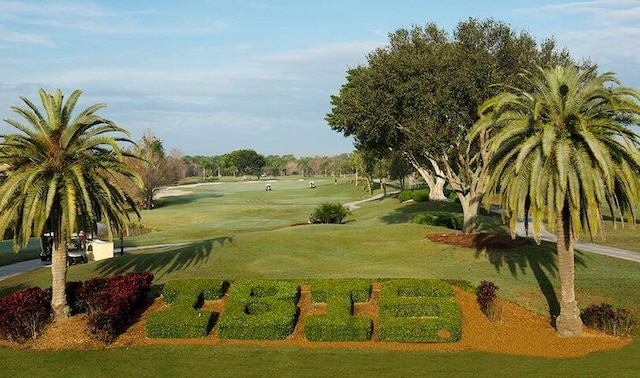 10255 Sand Cay Ln, West Palm Beach, FL 33412 - view of property's community with golf course view and a yard