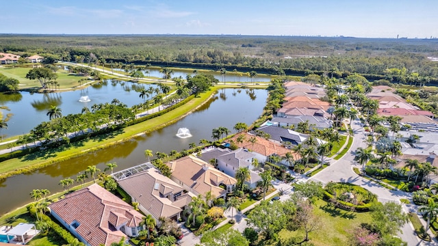 birds eye view of property featuring a residential view and a water view