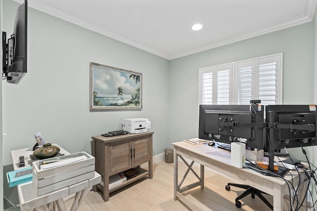 office space featuring crown molding, baseboards, light wood-type flooring, and recessed lighting