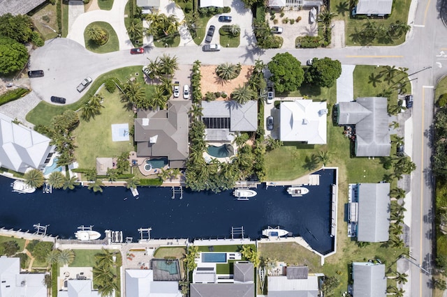 aerial view featuring a water view and a residential view