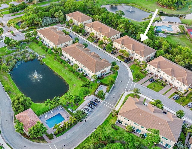 aerial view featuring a residential view and a water view