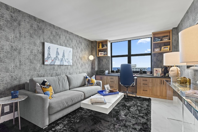 living room featuring marble finish floor