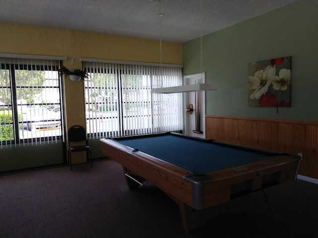 game room with billiards, carpet, a wainscoted wall, wood walls, and a textured ceiling