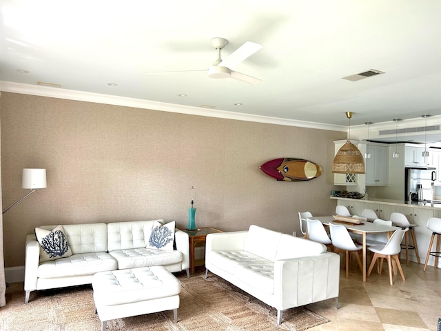 609 NE 19th Ave, Deerfield Beach, FL 33441 - living area with crown molding, a ceiling fan, and visible vents