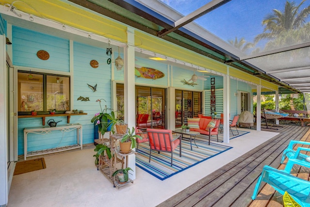 wooden deck featuring a lanai