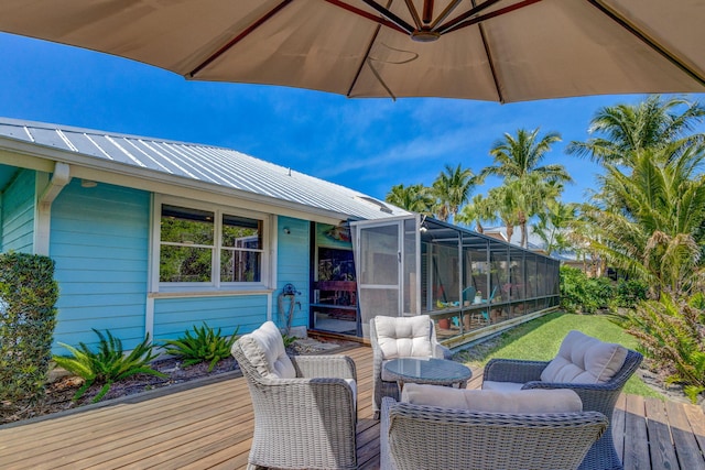 wooden deck featuring a lanai