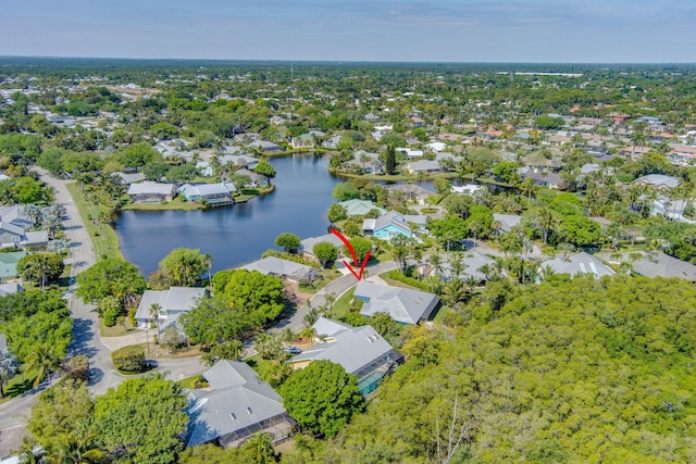 aerial view with a residential view and a water view