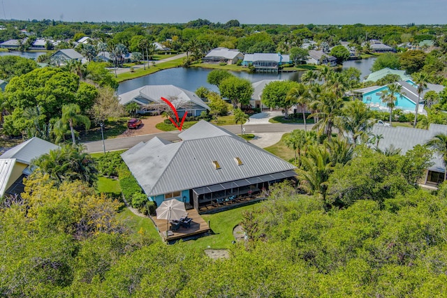 aerial view with a residential view and a water view