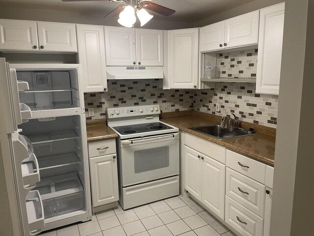 400 Village Green Cir W Unit 202, Palm Springs, FL 33461 - kitchen with electric range, range hood, a sink, fridge, and dark countertops