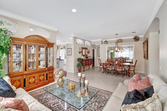 living room featuring light tile patterned floors, baseboards, recessed lighting, ornamental molding, and a notable chandelier