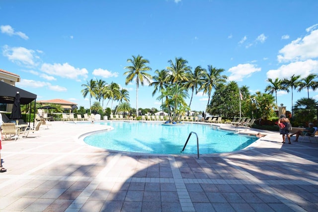 community pool with a patio