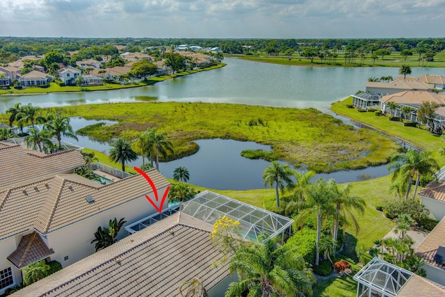 drone / aerial view with a water view