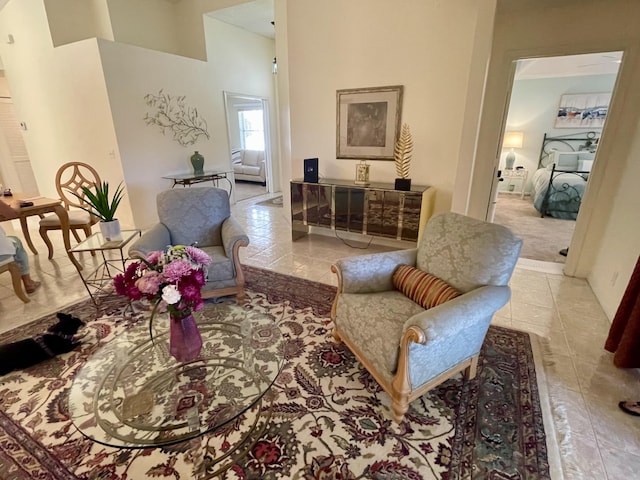 living area featuring tile patterned floors