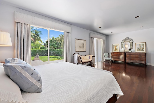 bedroom featuring dark wood-style floors and recessed lighting