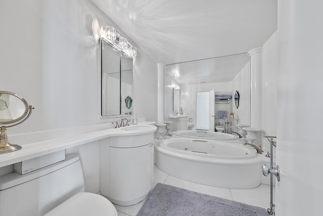 full bath featuring tile patterned floors, toilet, a bath, and vanity