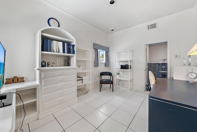 interior space with light tile patterned floors, baseboards, visible vents, a textured ceiling, and crown molding