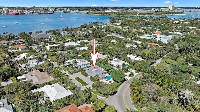 birds eye view of property featuring a residential view and a water view