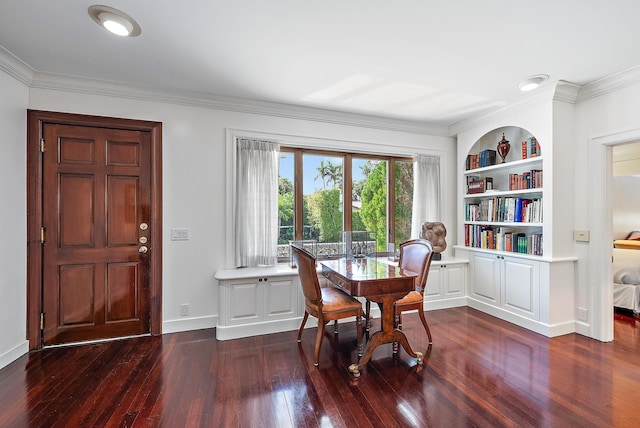 dining space with built in shelves, crown molding, baseboards, and dark wood-style flooring