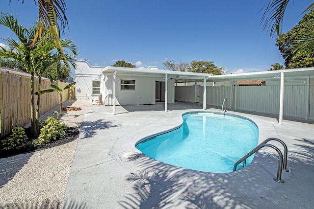 view of pool with a patio area, a fenced backyard, and a fenced in pool