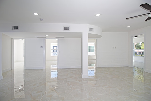 spare room with recessed lighting, visible vents, marble finish floor, and ceiling fan