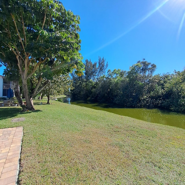 view of yard featuring a water view