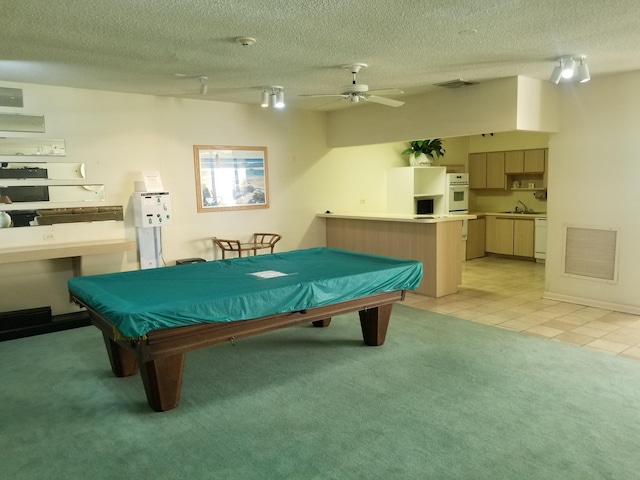 playroom featuring visible vents, billiards, light tile patterned flooring, light colored carpet, and ceiling fan